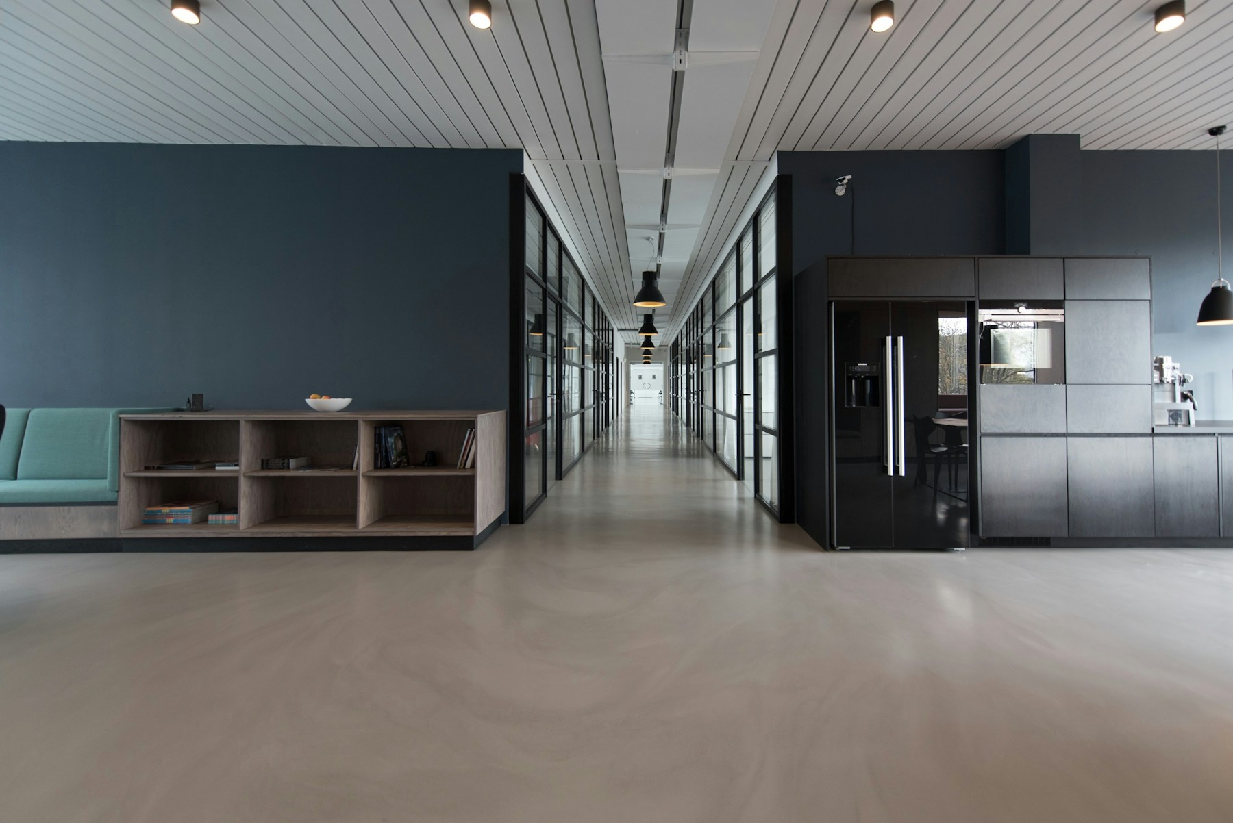Workplace lounge with editorial palette.